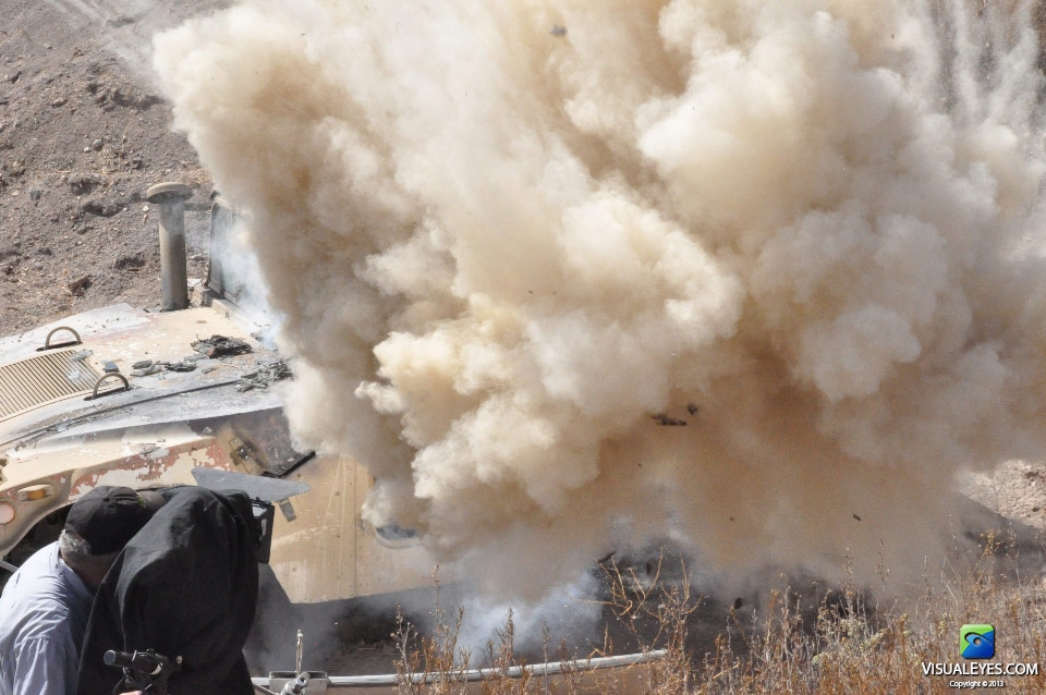 VISUAL EYES Emotive Storytelling Team captures close up of Humvee destruction