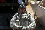 SFC Reiley in make up in between takes