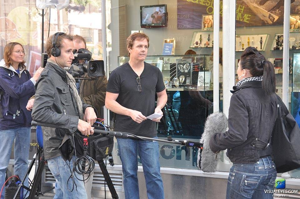 Dr. Gerard Gibbons Director VISUAL EYES Emotive Storytelling Team conducts interviews on location in London, England