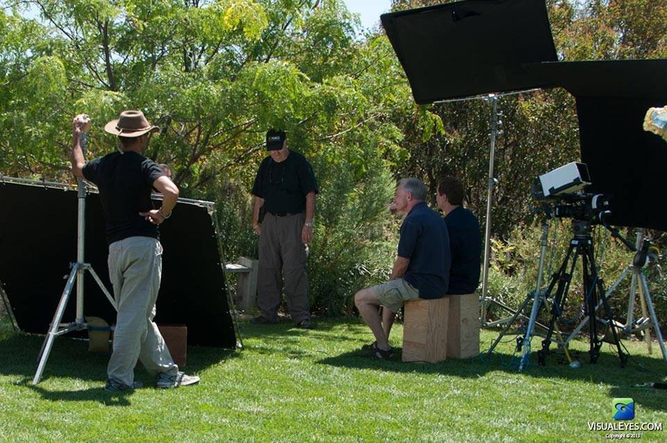 Dr. Gerard Gibbons and Perry Bosmajian with VISUAL EYES Emotive Storytelling Team during Battles of the Mind production speaks with veteran in between filming.